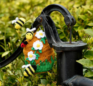 Another item featured in the display shows a knitted beehive