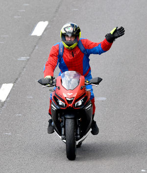 A rider in Spiderman costume 