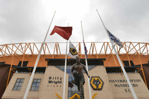 The flags at Molineux flying at half mast in memory of Wolves supporter Mr Matthews