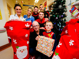 Supporting image for story: Kind club hands out presents at hospital