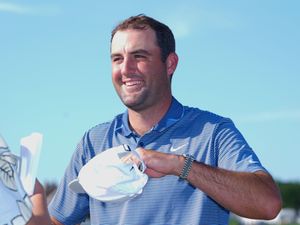 Scottie Scheffler smiles after winning the CJ Cup Byron Nelson golf tournament