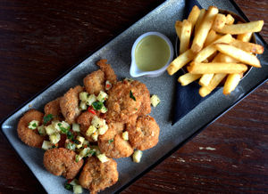 Scampi and salsa with chips and curry sauce