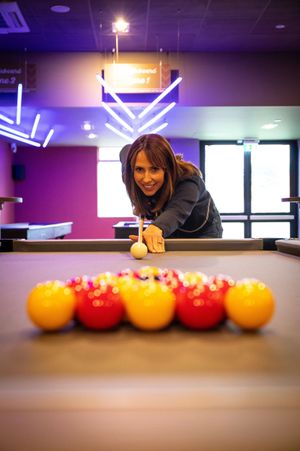 A game of pool in the new Sports Cafe for Alex Jones at Unity Beach.
