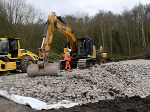 Supporting image for story: Telford landslip: Rail bosses 'aiming' to reopen line before this weekend