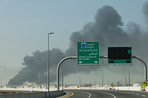 A plume of smoke rises in Dubai following a reported Iranian strike. (Photo by Fadel SENNA / AFP via Getty Images)