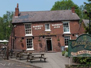 Supporting image for story: Fire rips through historic Crooked House pub days after sale to private buyer