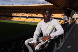 Mateus Mane signs his first professional contract with Wolves, aged 17 (Picture: Wolves)