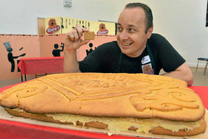 Supporting image for story: Oswestry club creates world record-breaking 16kg custard cream