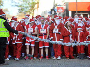 Supporting image for story: Santas cut a dash in fun run