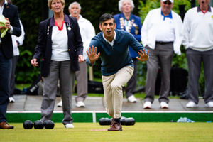 Prime Minister Rishi Sunak plays a game of bowls during a visit to Market Bosworth Bowling Club
