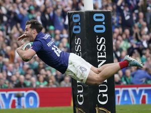 France’s Damian Penaud scores their side’s fifth try against Ireland, diving in the air to touch down with a smile on his face.