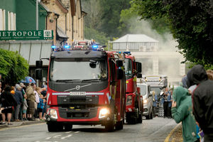 Fire appliances from Mid and West Wales Fire Service led the parade with their blue lights flashing. Image by Andy Compton