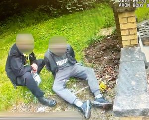 Police with the arrested man