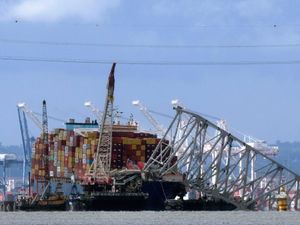 Supporting image for story: Dali cargo ship leaves Baltimore, three months after fatal bridge collapse