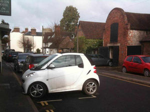 Supporting image for story: Smart car driver squeezes in to space on Shropshire street