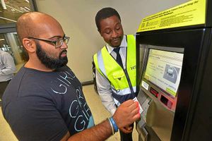 Mark Molai helping Satnaham Singh from Penn