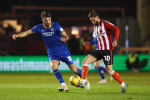 Tom Bloxham of Shrewsbury Town and Ed Bishop of Lincoln City (AMA)