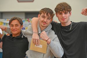 A-Level results at Idsall School, Shifnal. Centre, Zach Nixon with friends.