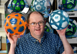 Golden Bear Ltd MD Barry Hughes with some of the hi-tech footballs
