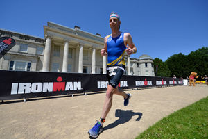 One athlete runs past Shugborough in this year's Ironman event 