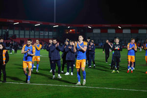 Players celebrate the win