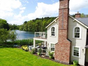 Supporting image for story: Luxury home with zip line across private lake on market for £1.45m