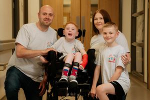 Liam Finazzi, in wheelchair, with father Andrew, mother Kerry and borther Callum