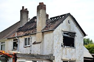 The blaze ripped through the house, also affecting two neighbouring properties 