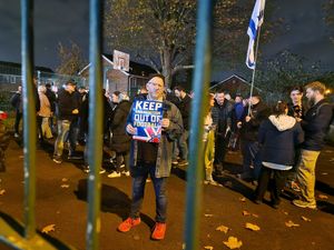 Counter-protesters carried slogans opposing antisemitism