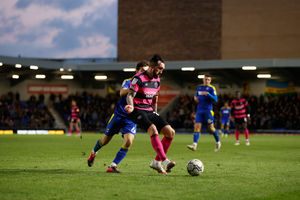 Ryan Bowman of Shrewsbury Town and Ben Heneghan of AFC Wimbledon (AMA)