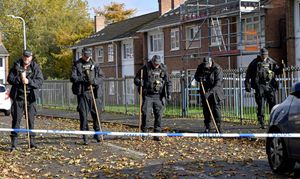 Police and scene of crime officers at Lilleshall Crescent, Wolverhampton, after a murder inquiry is launched after man is shot dead
