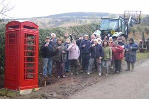 Supporting image for story: Villagers' succesful call for their red phone box's return
