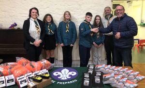 Kevin Robinson Trustee of Kington Walks presenting the equipment to 1st Kington Scouts.