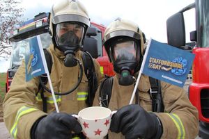 Staffordshire firefighters pose for county celebrations at headquarters in Stone