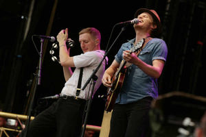 Jeremiah Fraites (left) and Wesley Schultz of The Lumineers performing on the Main Stage, during day three of the Reading Festival. PRESS ASSOCIATION Photo. Picture date: Sunday August 25, 2013.