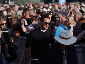 Supporting image for story: Roger Federer joins fans for Bruce Springsteen BST performance