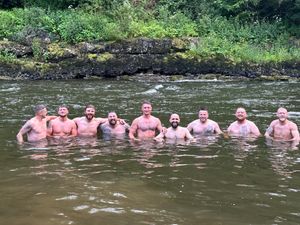 Supporting image for story: Why this group of men are taking to the water and letting out primal screams at 6am