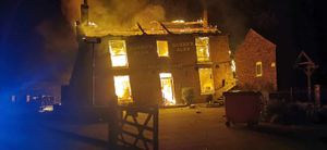 The Crooked House burning on Saturday night. Photo: Chris Green