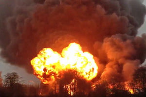Flames rise into the sky after one of several explosions during the fire at Astonfields Industrial Estate in Stafford