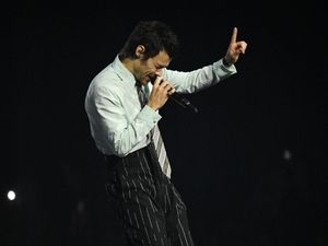 Supporting image for story: Harry Styles remains at number one on album chart for a second week