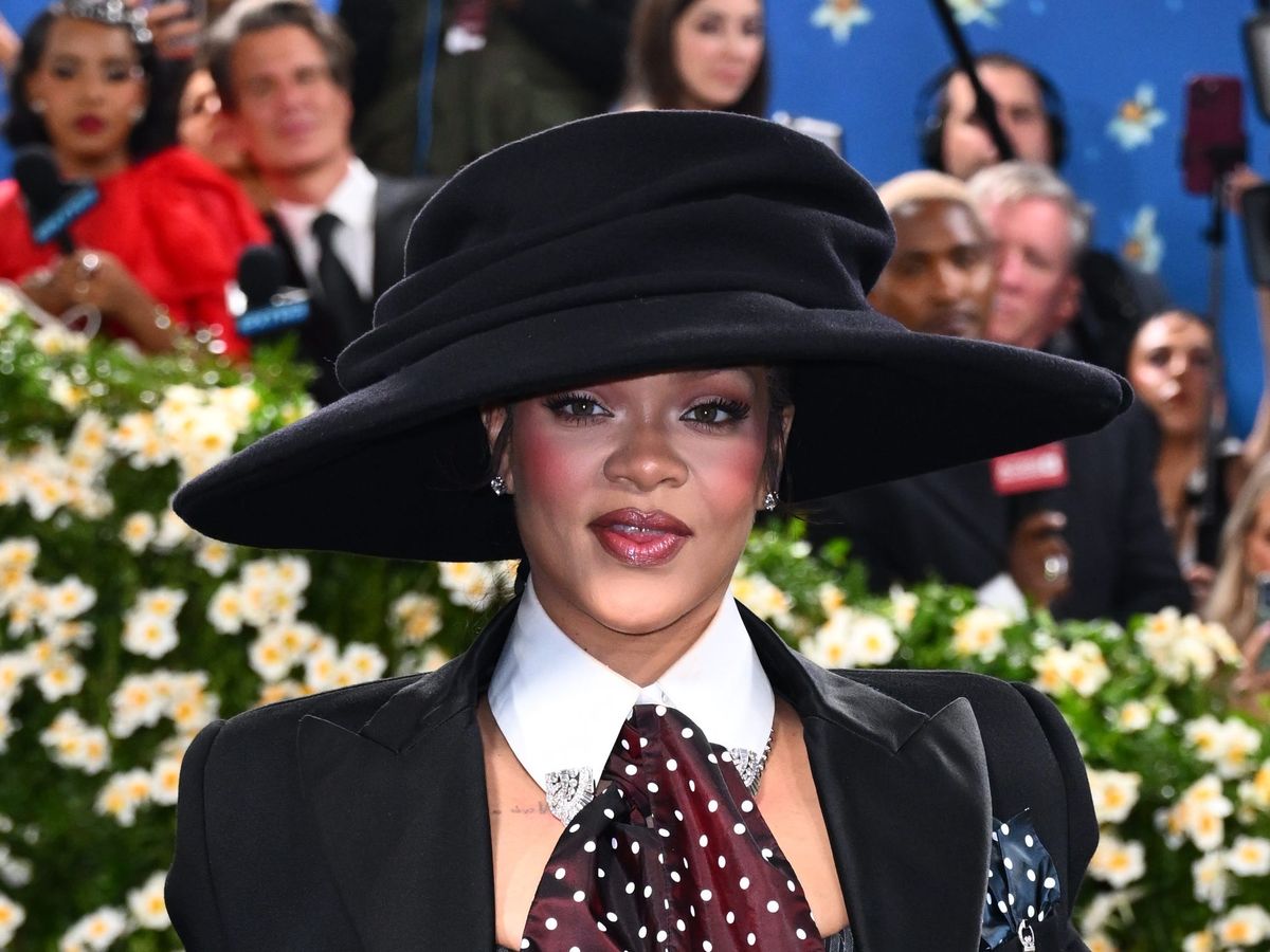 Rihanna debuts baby bump on star-studded Met Gala blue carpet