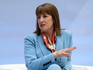 Rachel Reeves, wearing a blue suit, speaks at the forum Debate on the Global Economy in Washington