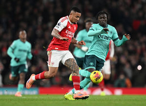 Gabriel Jesus of Arsenal takes on Mateus Mane of Wolves (Photo by David Price/Arsenal FC via Getty Images)