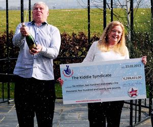 Robin and Christine Kiddie from Ludlow celebrate after winning the £6,299,421 in 2013