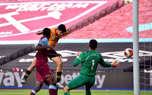Wolverhampton Wanderers' Raul Jimenez scores