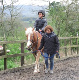 Happy rider and helper.