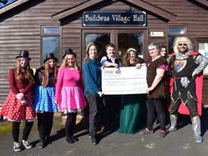 Supporting image for story: Drama group donates to county charity