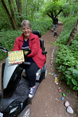 Chris painted a stone with a cobra's head and popped at the entrance of Bluebell Woods in Perton