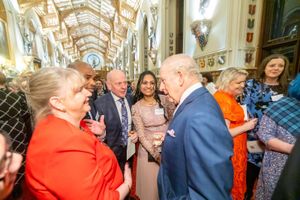 Care heroes, from left, Carol Dight, Taurai Zimbi, Mario Kreft MBE and Shiny Skaria chatting to King Charles at the Windsor Castle reception.