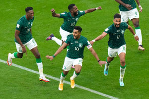 Saudi Arabia's Salem Al-Dawsari, center, celebrates after scoring his side's second goal during the World Cup group C soccer match between Argentina and Saudi Arabia at the Lusail Stadium in Lusail, Qatar, Tuesday, Nov. 22, 2022. (AP Photo/Luca Bruno).